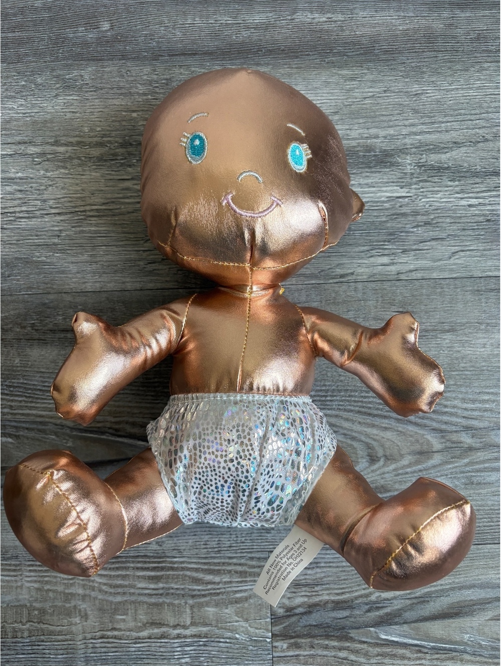 IRIS 2024 Metallic Rose Gold King Baby Doll Plush with Embroidered Diaper